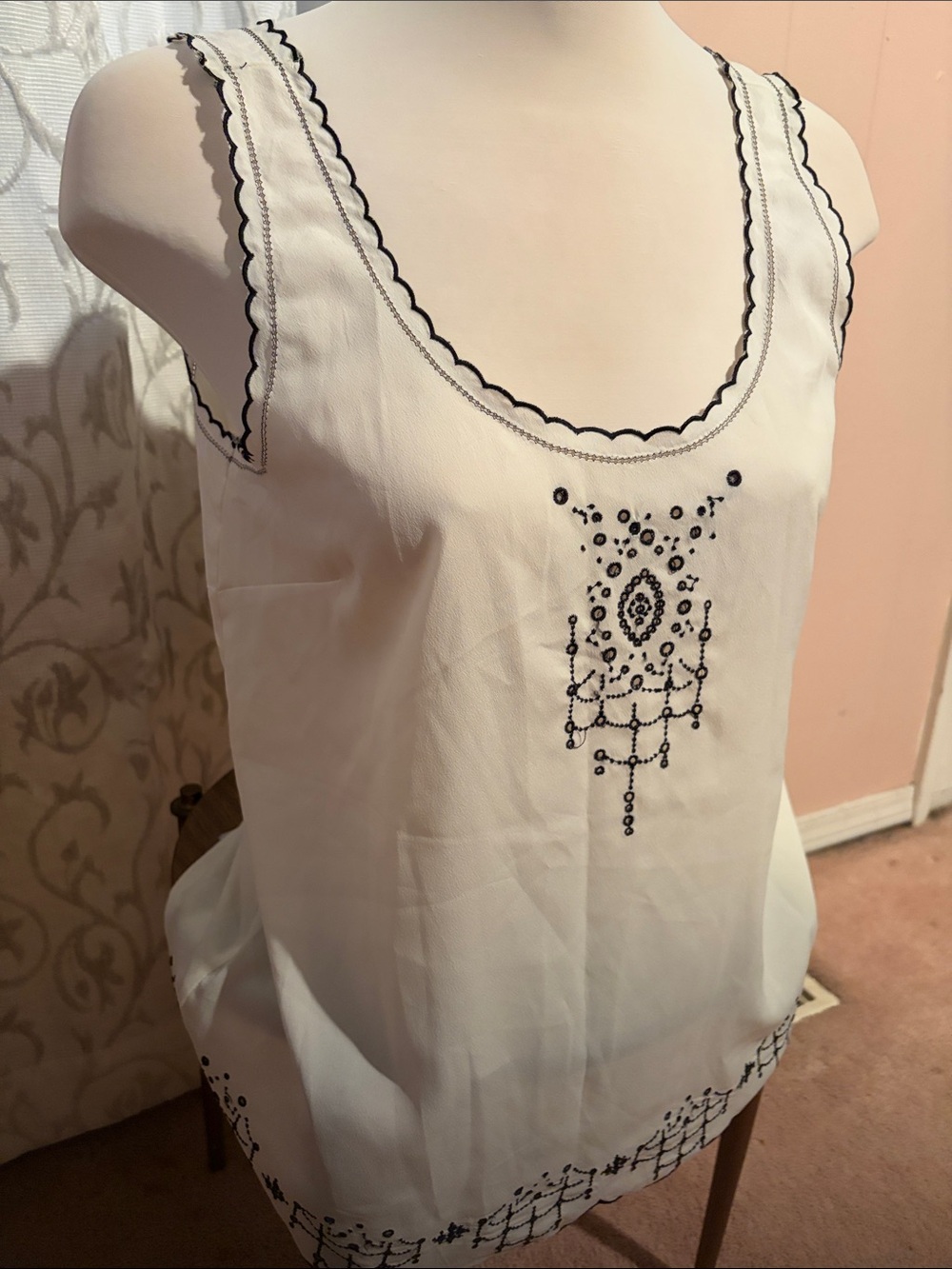 Temperance Ivory Sleeveless Top with Black Scallop Trim